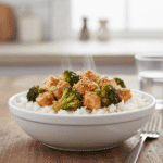 Game-changer detail: Adding broccoli partway through prevents it from turning to mush while chicken finishes cooking.